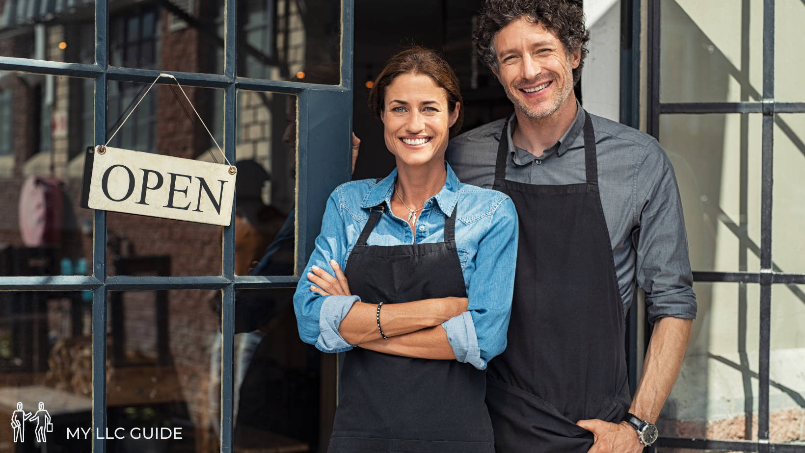 llc business woman and man outside cafe