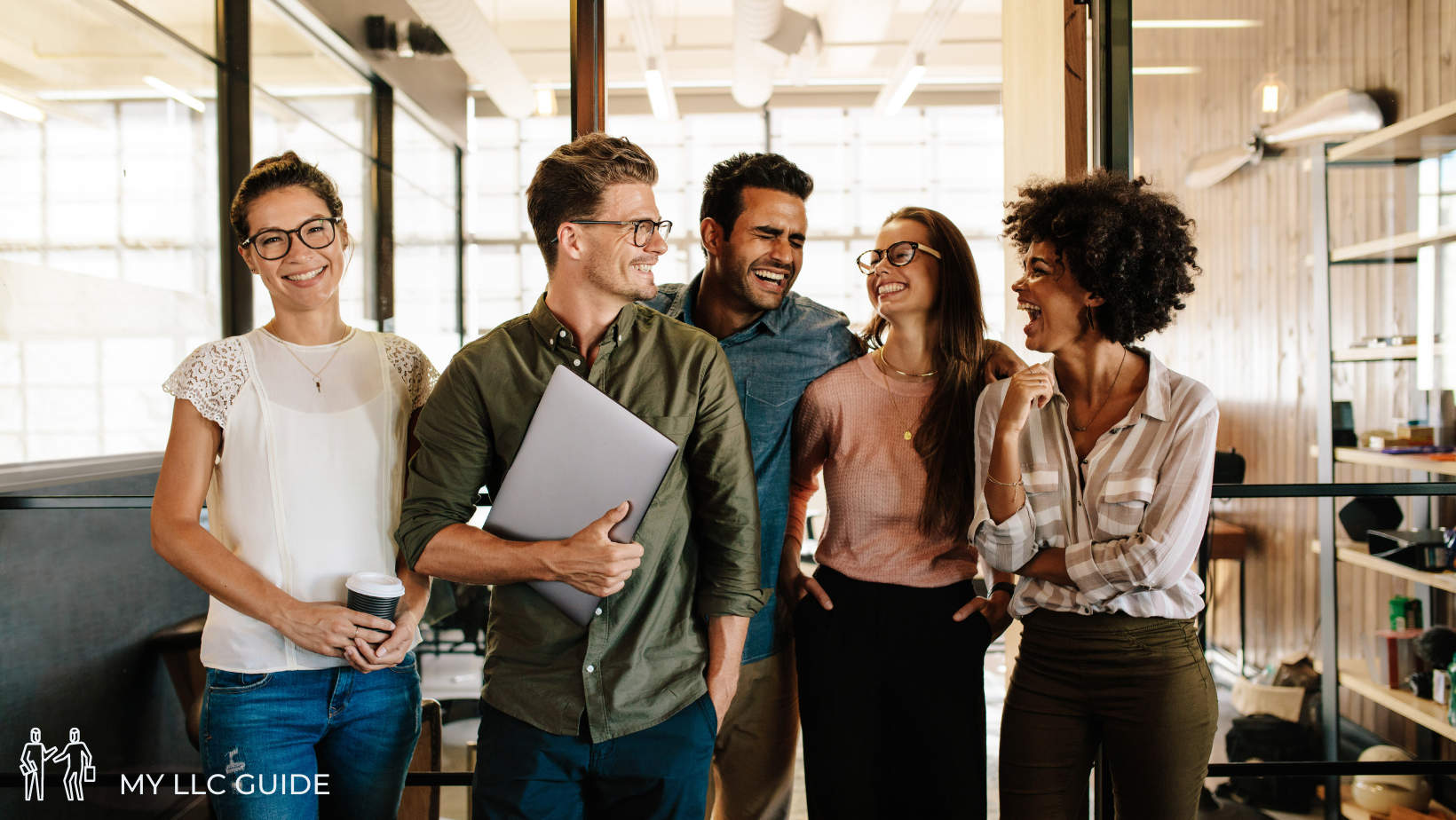 young llc business people standing together and smiling