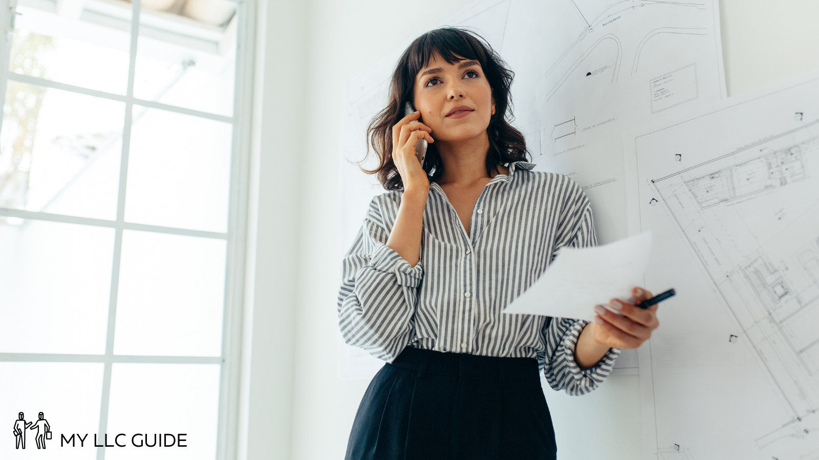 woman on a phone in an office setting