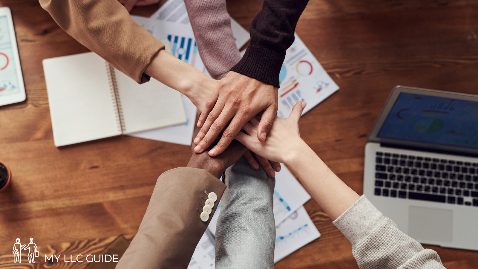 hands together in an office