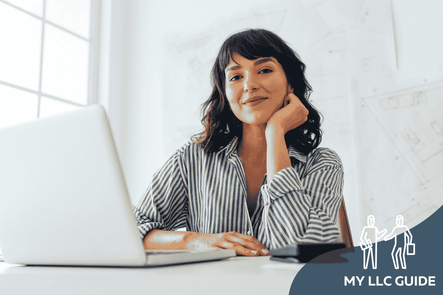 LADY WORKING AT LAPTOP